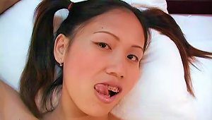 Pigtailed Asian Manages To Milk A Dick Dry On Her Lips