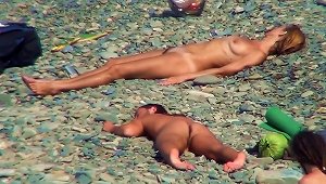 Sexy Nudists Are Posing And Lying Naked