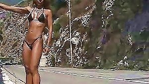 Milf Wearing A Bikini Shows Her Body Outdoors