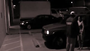 Parking Lot Action  By A Security Camera