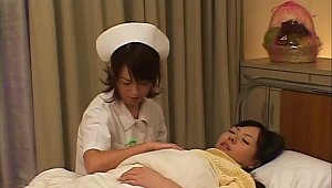 Naughty Japanese Nurse Seduces Her Patient Into A Heated Lesbians Action